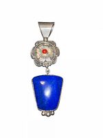 Front view of sterling pendant showing coral flower motif and lapis cabochon