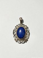 Front view of sterling silver pendant with lapis lazuli stone