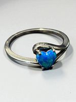 Top view showing heart opal and bypass setting