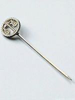 Front view of sterling silver hat pin showing Scales of Justice head and full pin