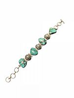 Full view of sterling silver toggle bracelet with turquoise and pearls