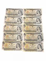 Front view of ten Canadian $1 notes laid out