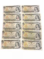 Front view of all ten Canadian $1 bills showing Queen Elizabeth II portrait and serial numbers