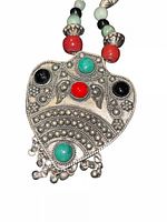 Front of pendant showing cabochons and dangles