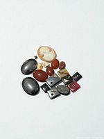 Group shot of all cabochons, cameos and signet stones