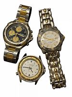 Group shot of three wristwatches showing overall condition and types