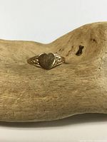 Front view showing heart bezel and shoulder detail