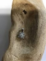 Front view of sterling silver diamond chip pendant