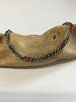 Full view of sterling silver anklet on wood prop