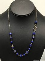 Necklace front view on display bust