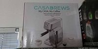 Retail box showing Casa Brews My CASA, My Coffee semi-automatic coffee machine image and branding
