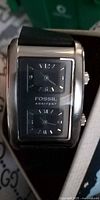 Front view of Fossil Arkitekt watch showing dual time dial