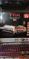 Boxed T-fal OptiGrill showing product image and branding