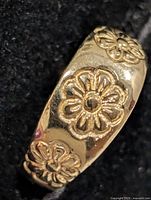 Full view of 10K yellow gold toe ring with floral design