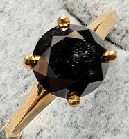 Ring angled view showing stone and prongs