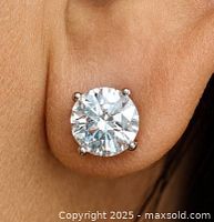 Stud earring worn in ear showing size and setting