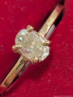 close-up of diamond solitaire and prongs