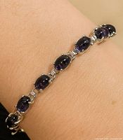 Bracelet on wrist showing full length and stones