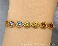 Bracelet on wrist showing gemstone layout