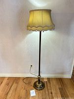 Full view of floor lamp with shade