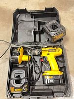 Drill, two chargers, two batteries and carry case