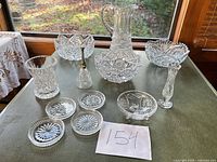 Full lot overview showing all twelve lead crystal pieces