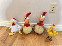 Four chicken items lined up on floor