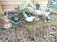 Group shot showing manual pump, electric pump, weathervane and roosters