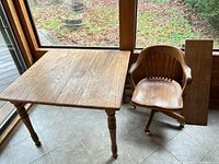 Table, chair, and leaf shown together