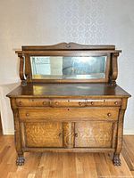 Front view showing entire sideboard and mirror