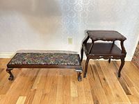 Side table and bench side by side showing design and finish