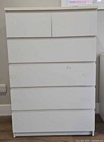 Front view showing all six drawers
