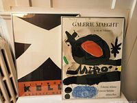 Both framed Galerie Maeght posters side by side
