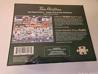 Back of Tim Hortons 500-piece puzzle box showing winter village image and details
