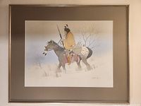 Full view of framed Donald Vann print showing Indigenous rider on horseback
