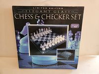 Front of retail box showing Elegant Glass Limited Edition Chess & Checker Set