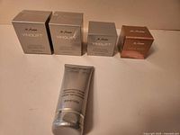 Front view showing all five sealed items: three Vinolift Skin Tightening Cream boxes, Magic Finish box, Vinolift Cleansing Cream tube