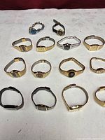 Group shot of all wristwatches laid out on cloth