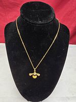 Full view of necklace on bust showing chain length and pendant size