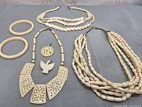 Full group showing all necklaces, bangles and pendants