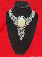 Front view of chainmail bib necklace on bust