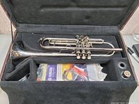 Trumpet in open Yamaha case with accessories visible