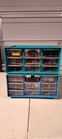 Front view of two stacked blue plastic drawer cabinets