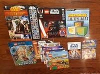 Group shot of all 10 books on hardwood floor