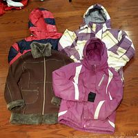 All four jackets laid out on floor