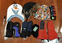 Group shot of all hats and mittens