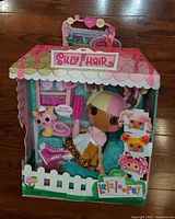 Front view of boxed Lalaloopsy Silly Hair Scoops Waffle Cone doll set