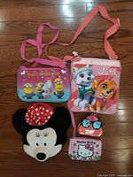 Group shot of all five purses and coin bags