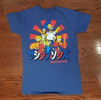 Full view of blue T-shirt with The Simpsons graphic and Japanese text