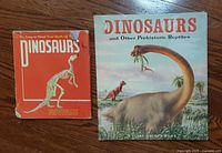 Front covers of both dinosaur books